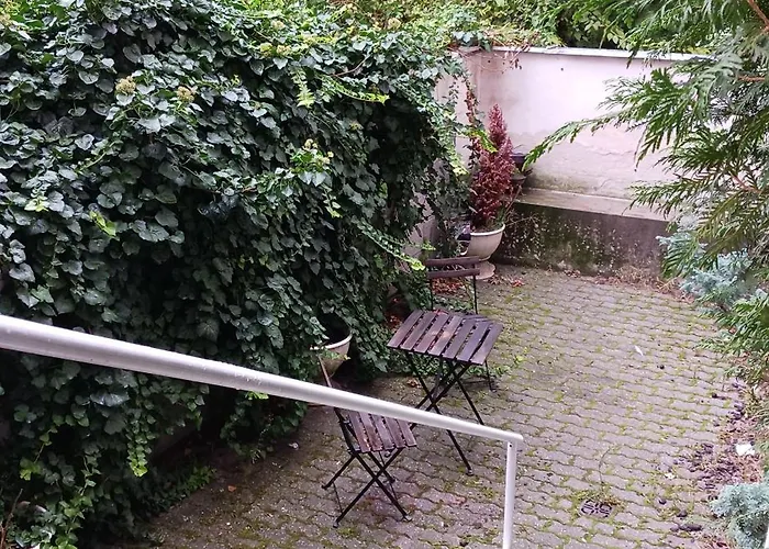 Gazde/Camere de închiriat Central Apartman *