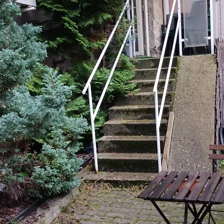 Gazde/Camere de închiriat Central Apartman *